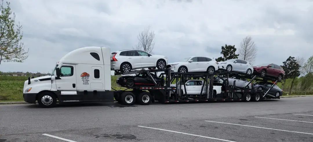 CA Auto Express open carrier truck fully loaded with vehicles